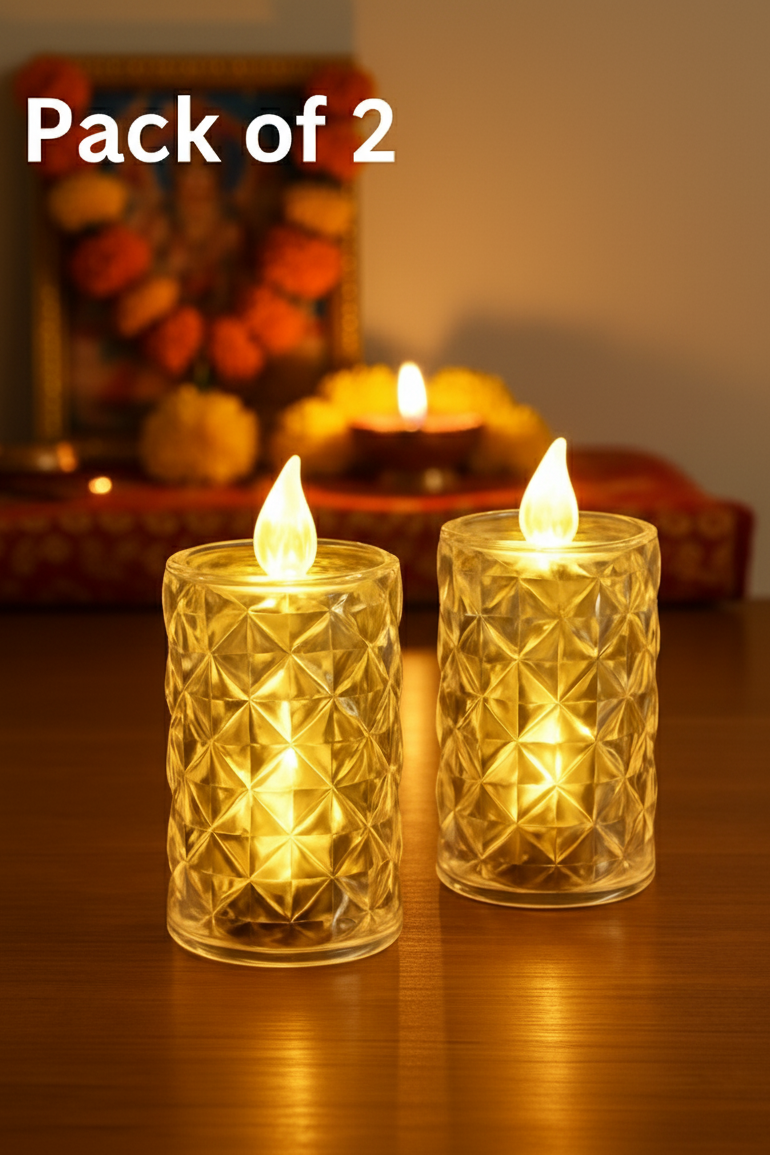 Two diamond-patterned candle lights on a reflective surface with blurred decorative items in the background.